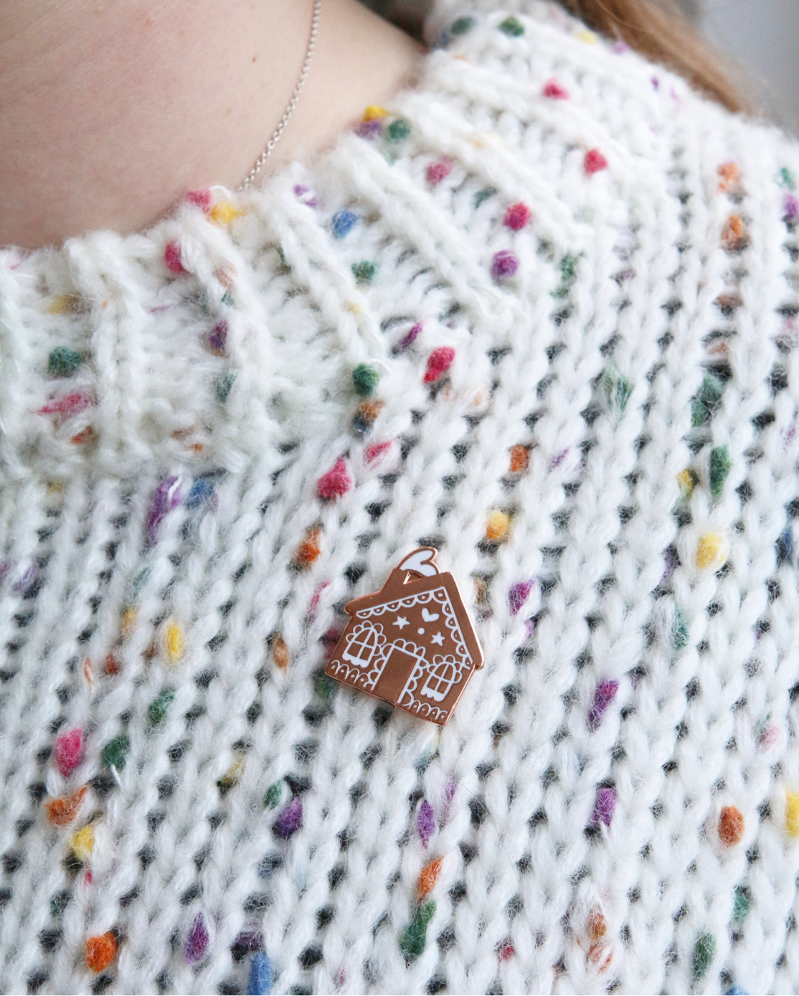 Enamel Gingerbread House Pin on Sweater