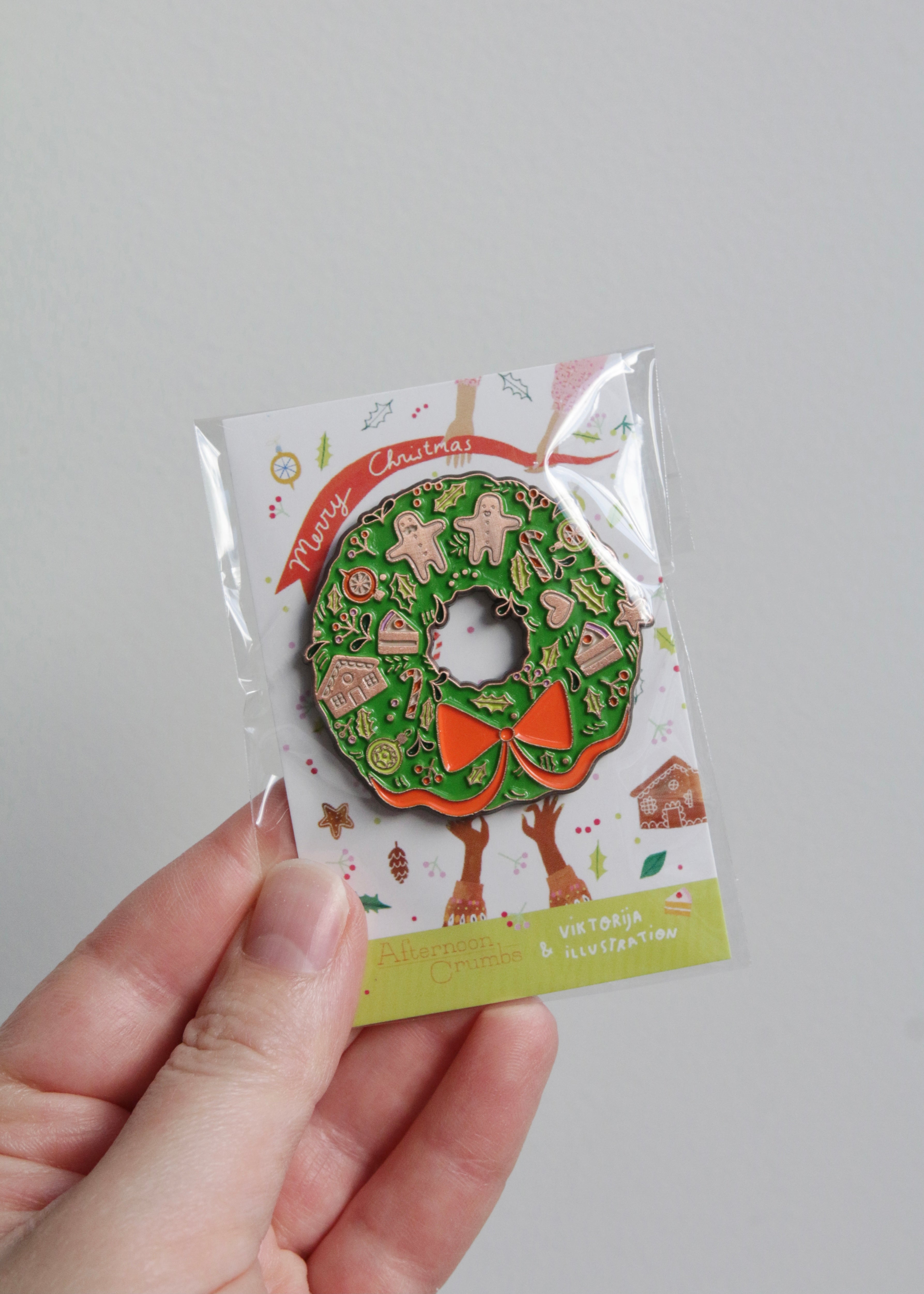 Holding Enamel Christmas Wreath Broach