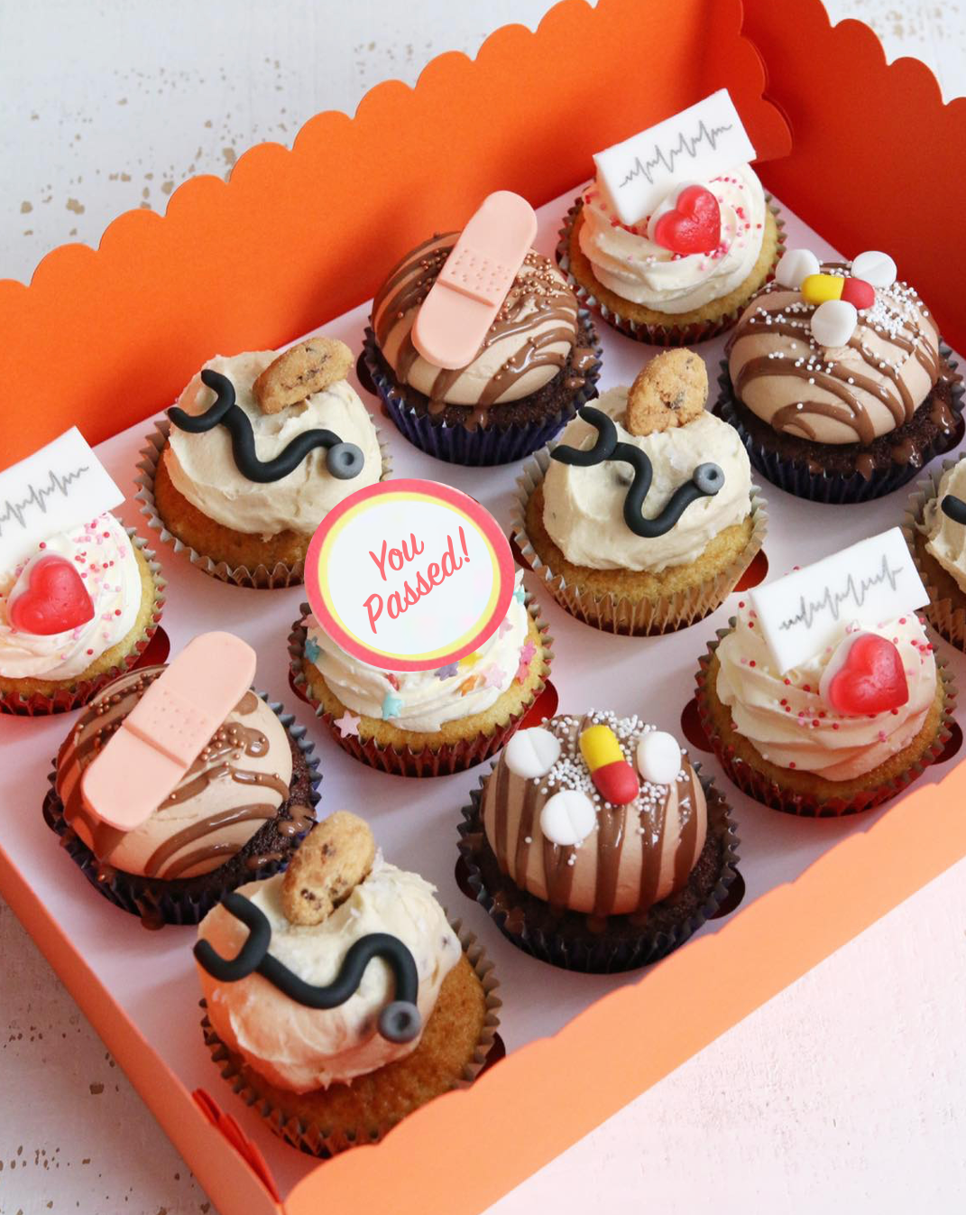 Box of Medical Graduation Cupcakes with You Passed Message