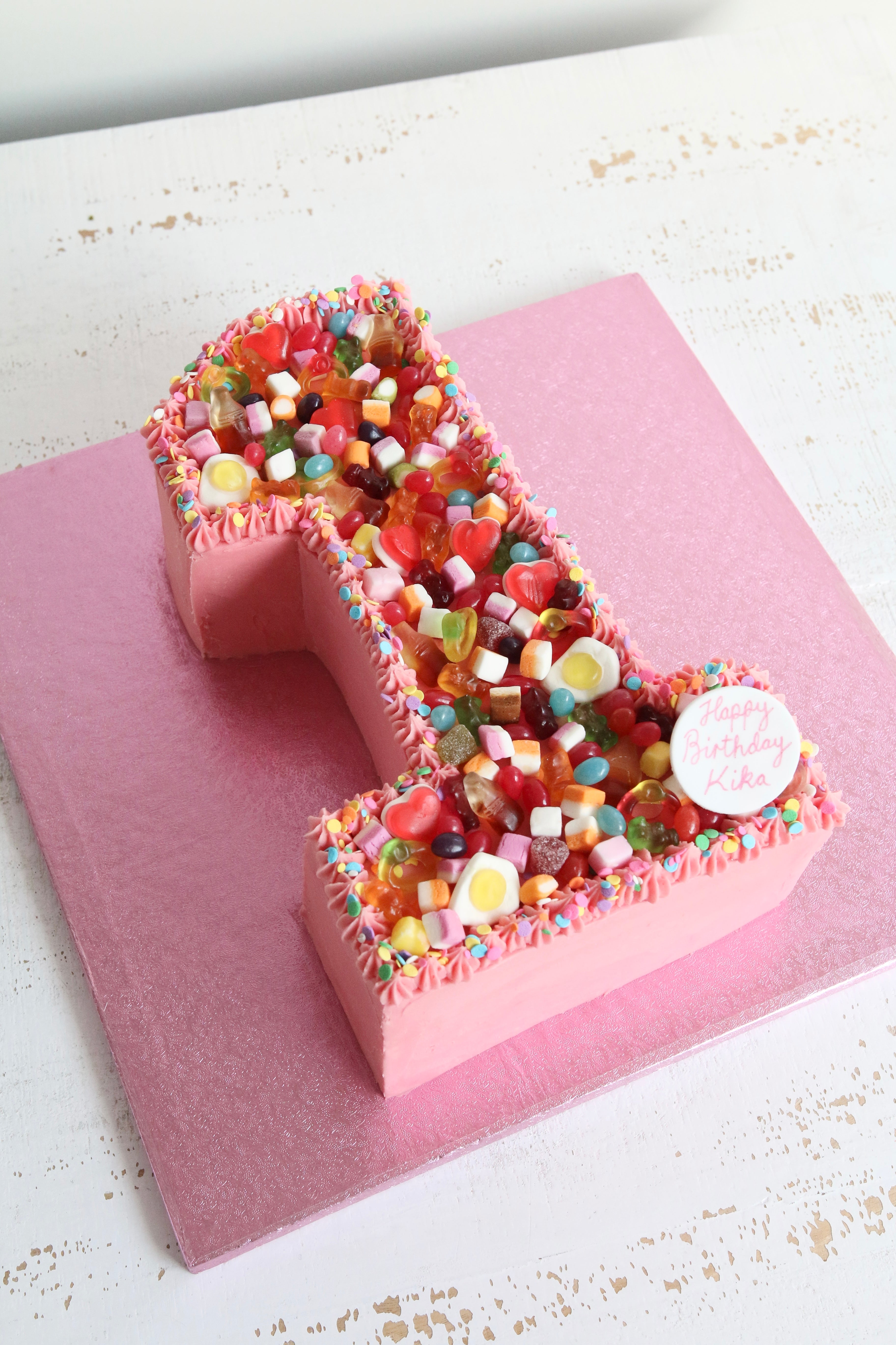 Pink Sweetie Number 1 First Birthday Cake