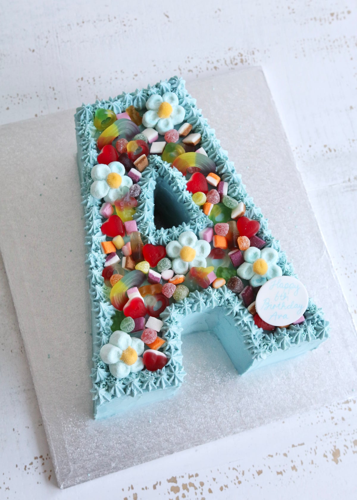 Blue Buttercream Letter A Cake with Sweets