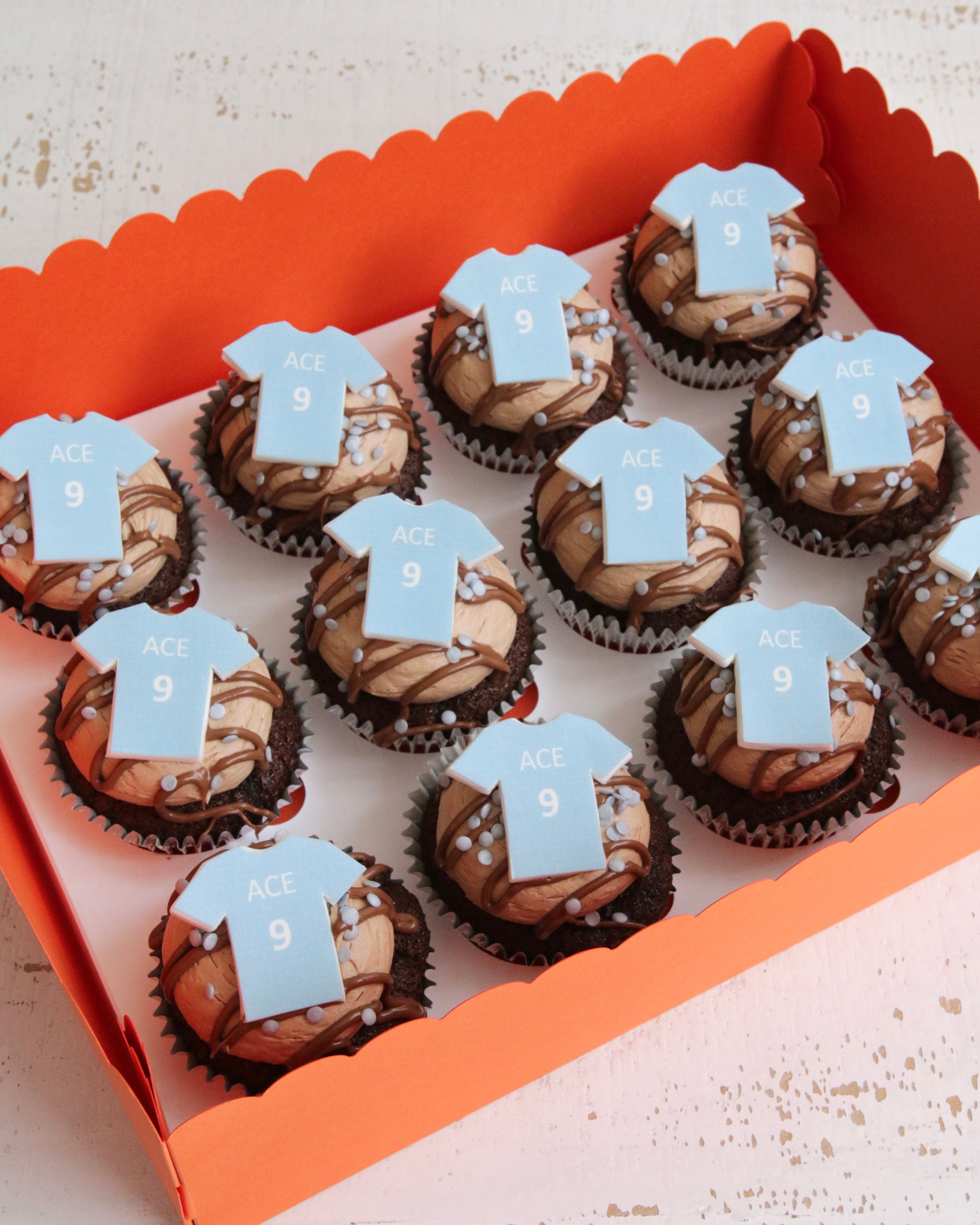 Chocolate Cupcakes with Personalised Blue Football Shirt Toppers