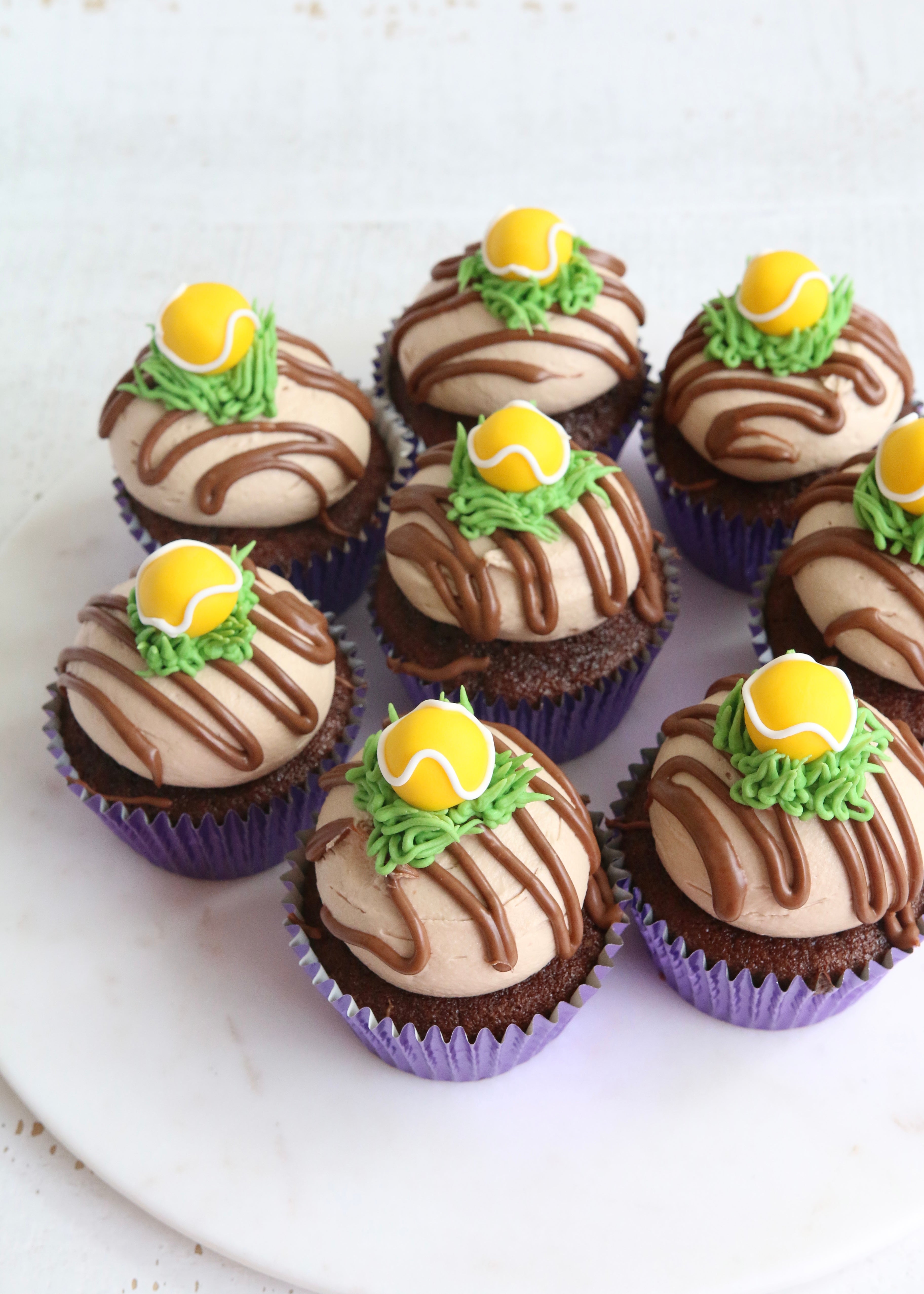 Chocolate Cupcakes with Buttercream Grass and Fondant Tennis Ball Decorations