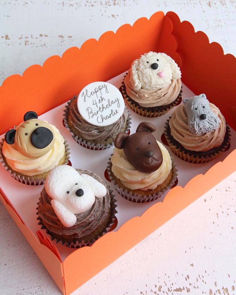 Cupcakes with dog heads and a birthday message