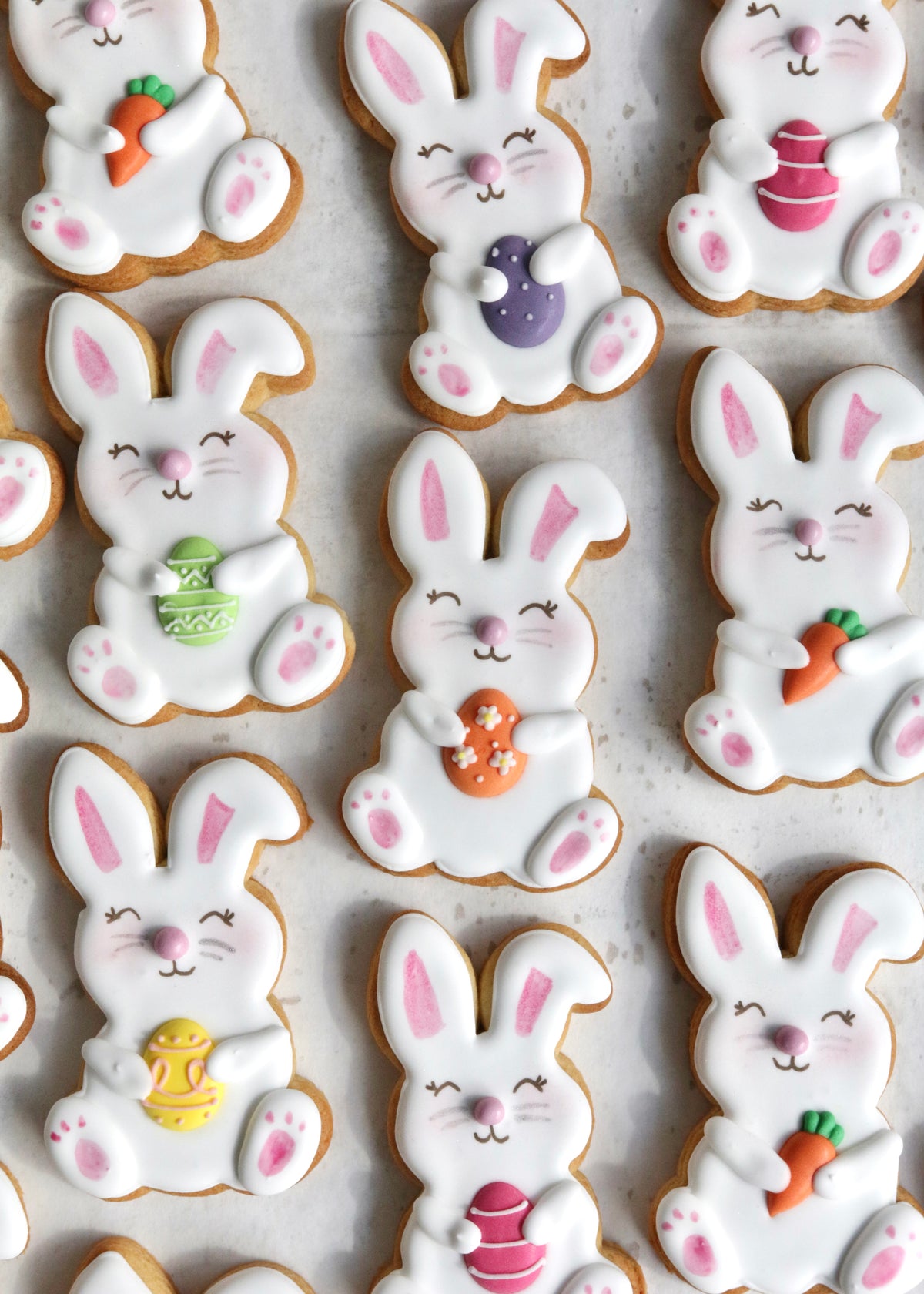 Eater Bunny Biscuits Holding Easter Eggs and Carrots