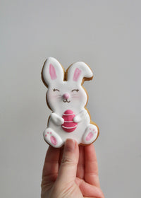 Easter Bunny Biscuits Holding Pink Egg