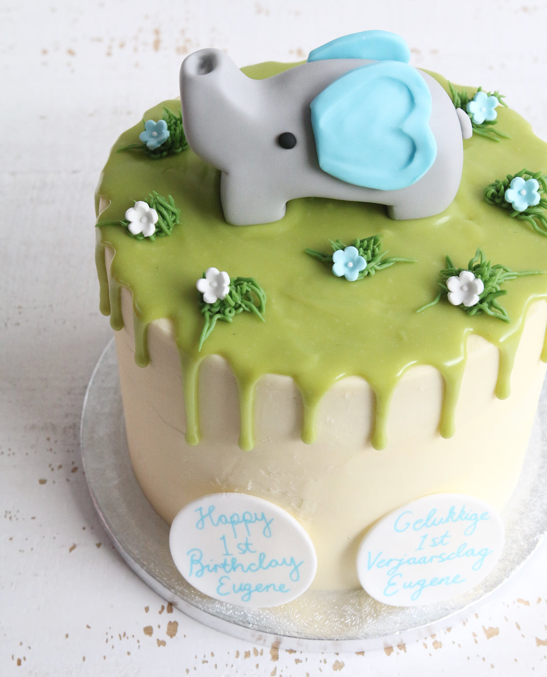 Green Drip Cake with Elephant with Blue Ears