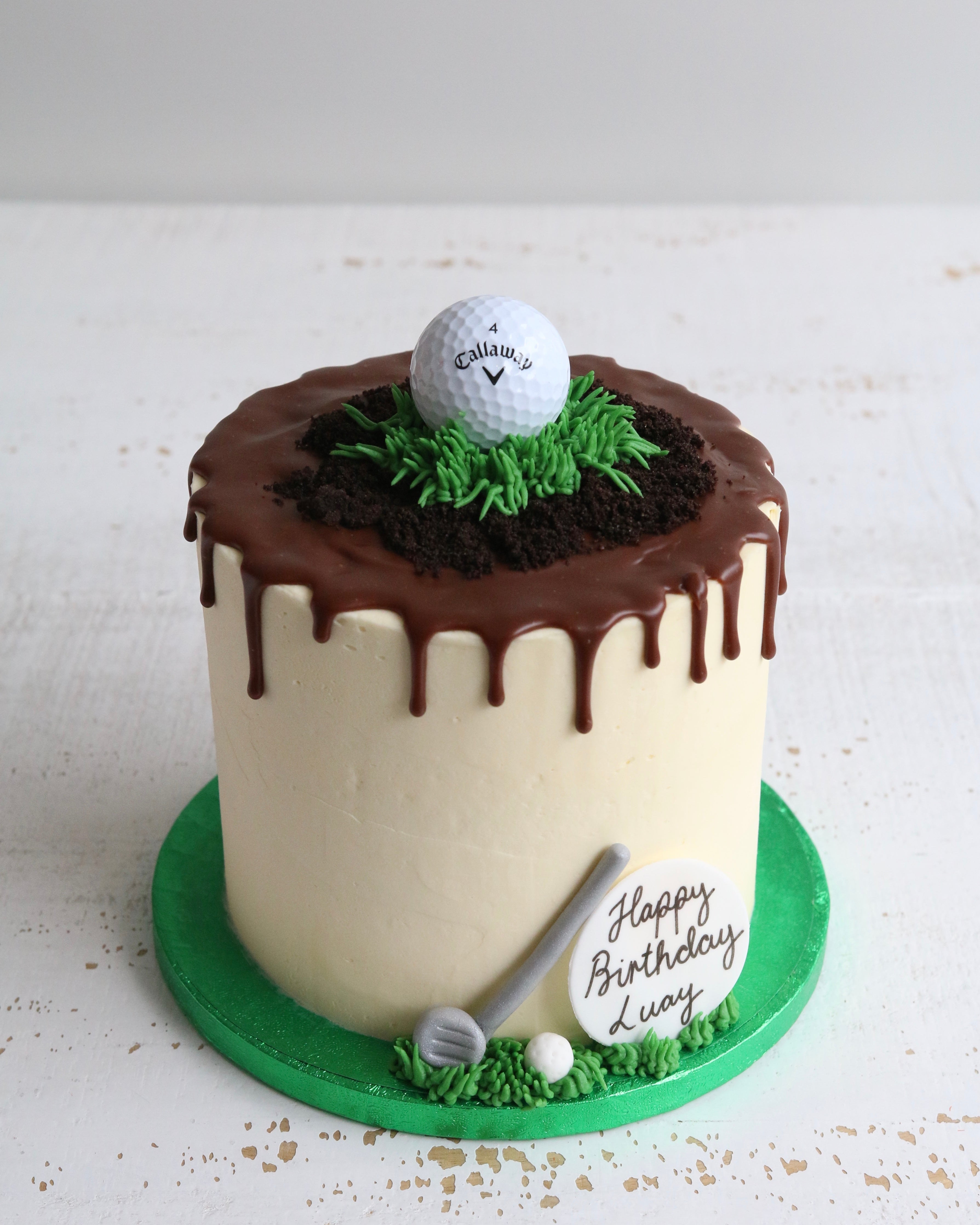 Birthday Cake with Chocolate Drip and Golf Ball and Club Decorations