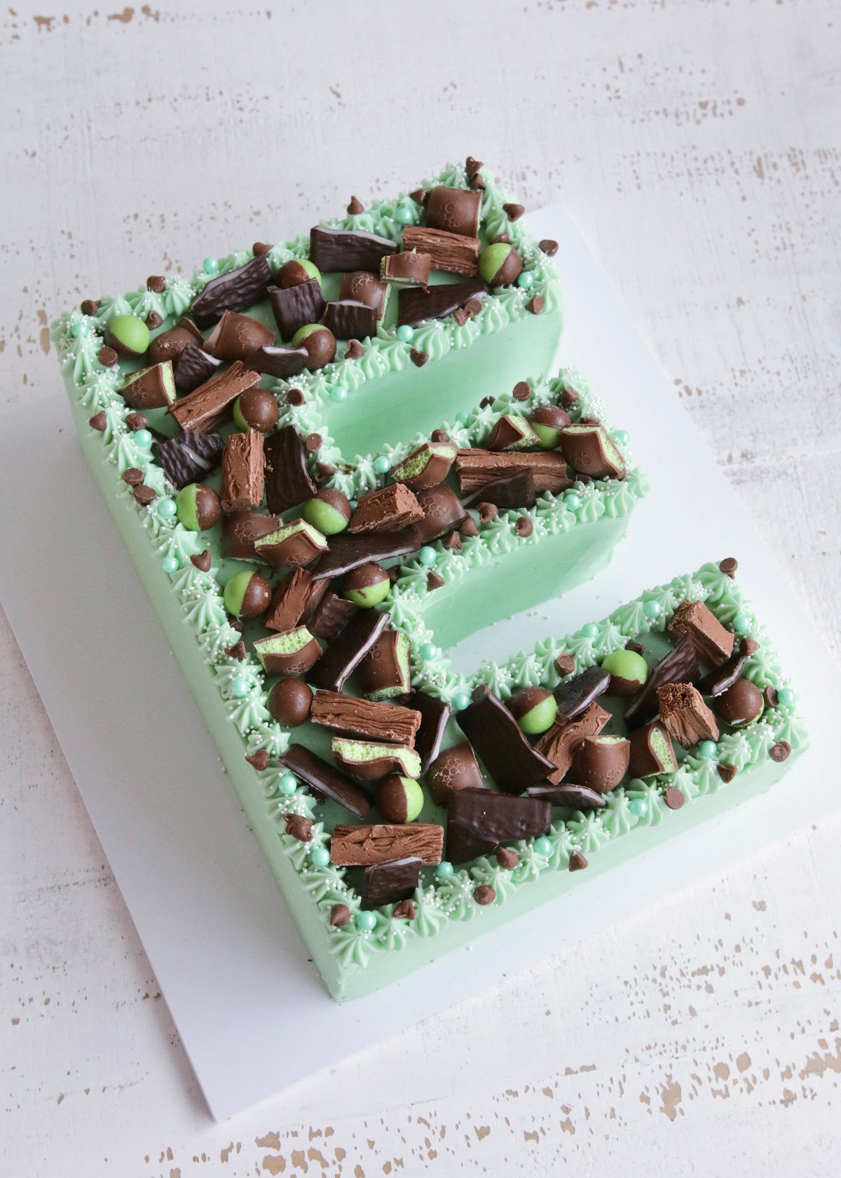 Green Buttercream Letter E Mint Choc Chip Cake