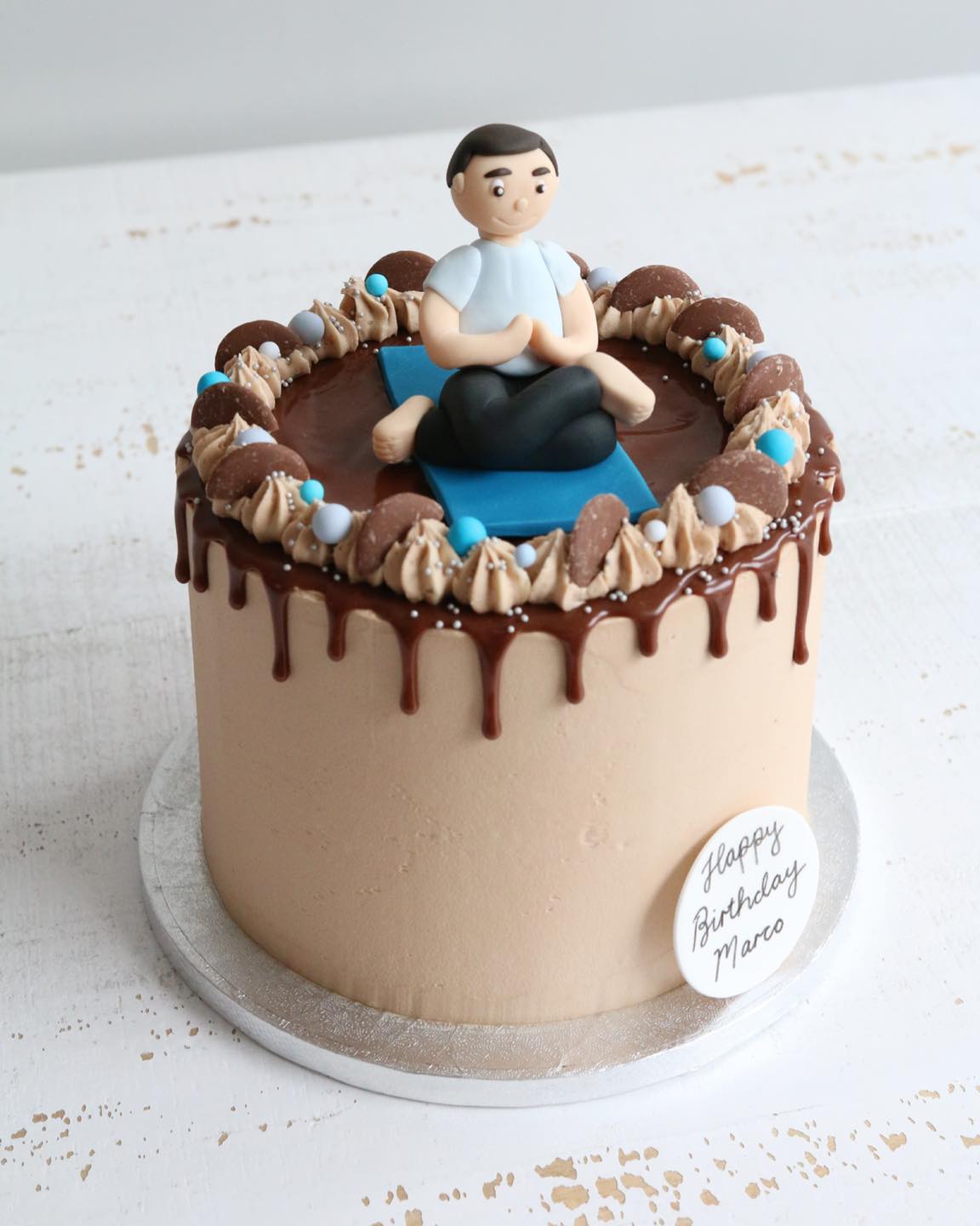 Chocolate Drip Cake with Fondant Yoga Figure