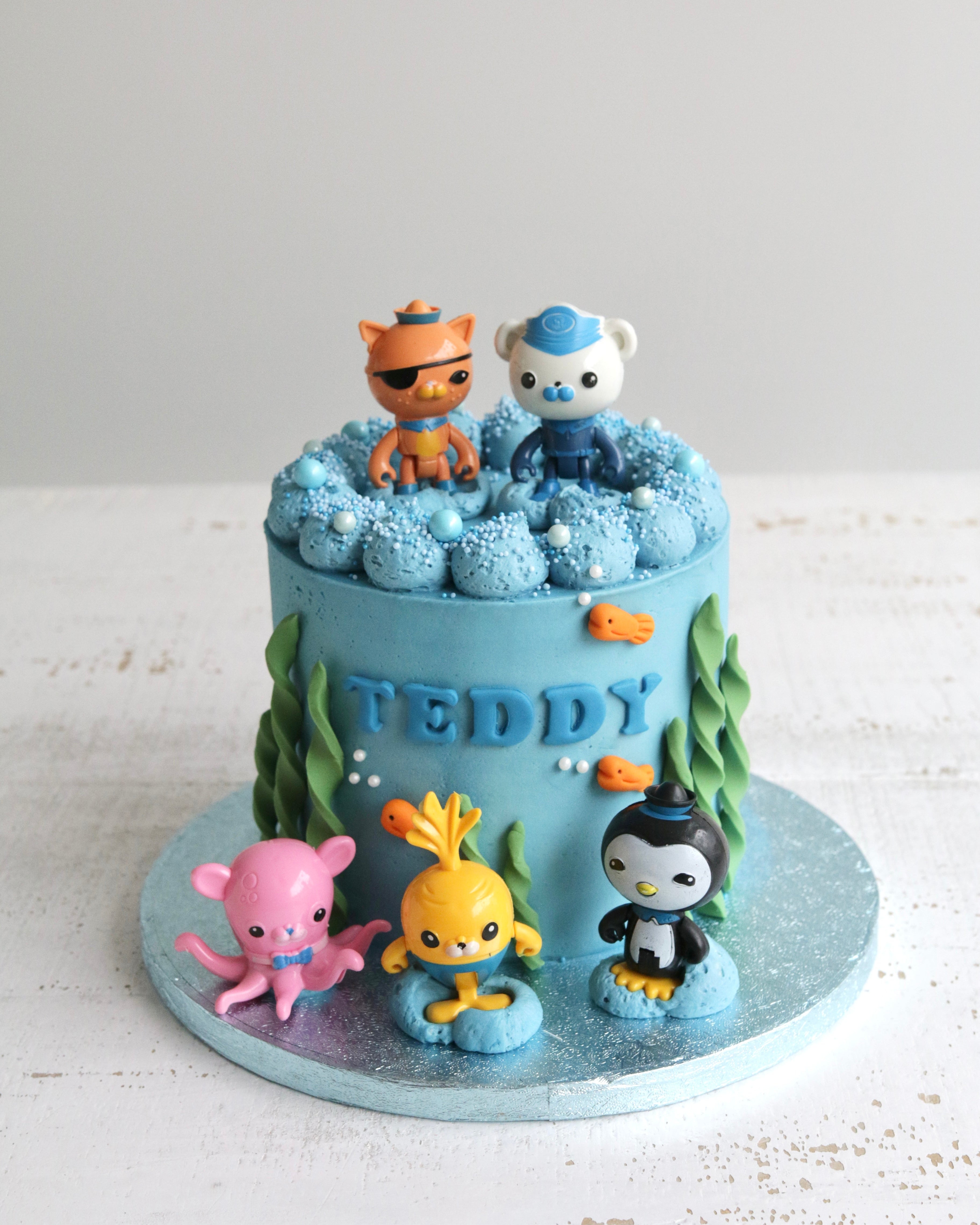 Blue Buttercream Cake with Toy Octonauts Decorations
