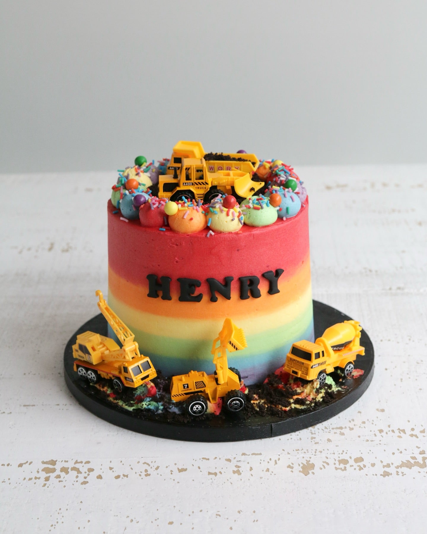 Rainbow Birthday Cake with Digger Toys