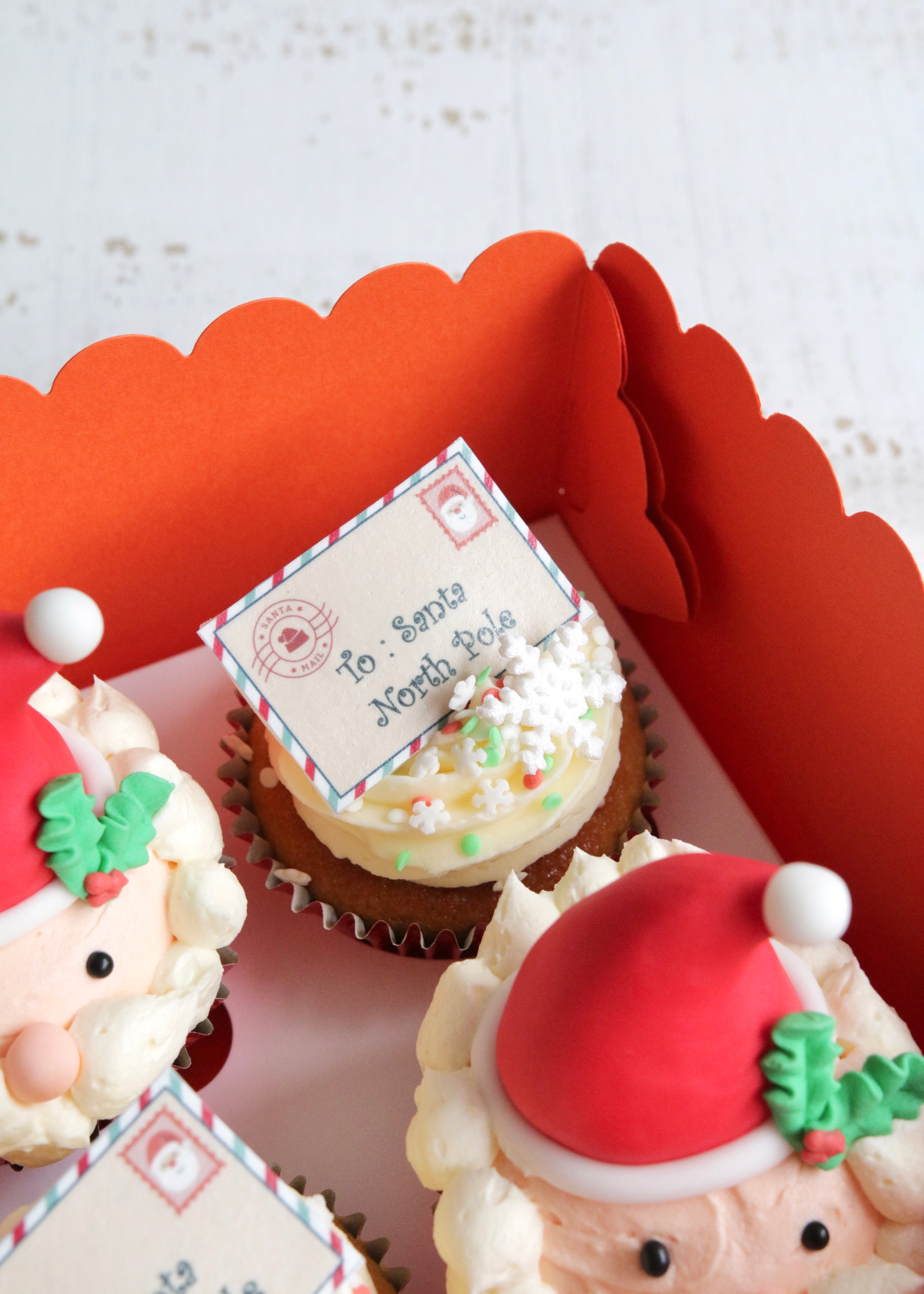 Box of Cupcakes with Close Up on Letter to Santa Decoration
