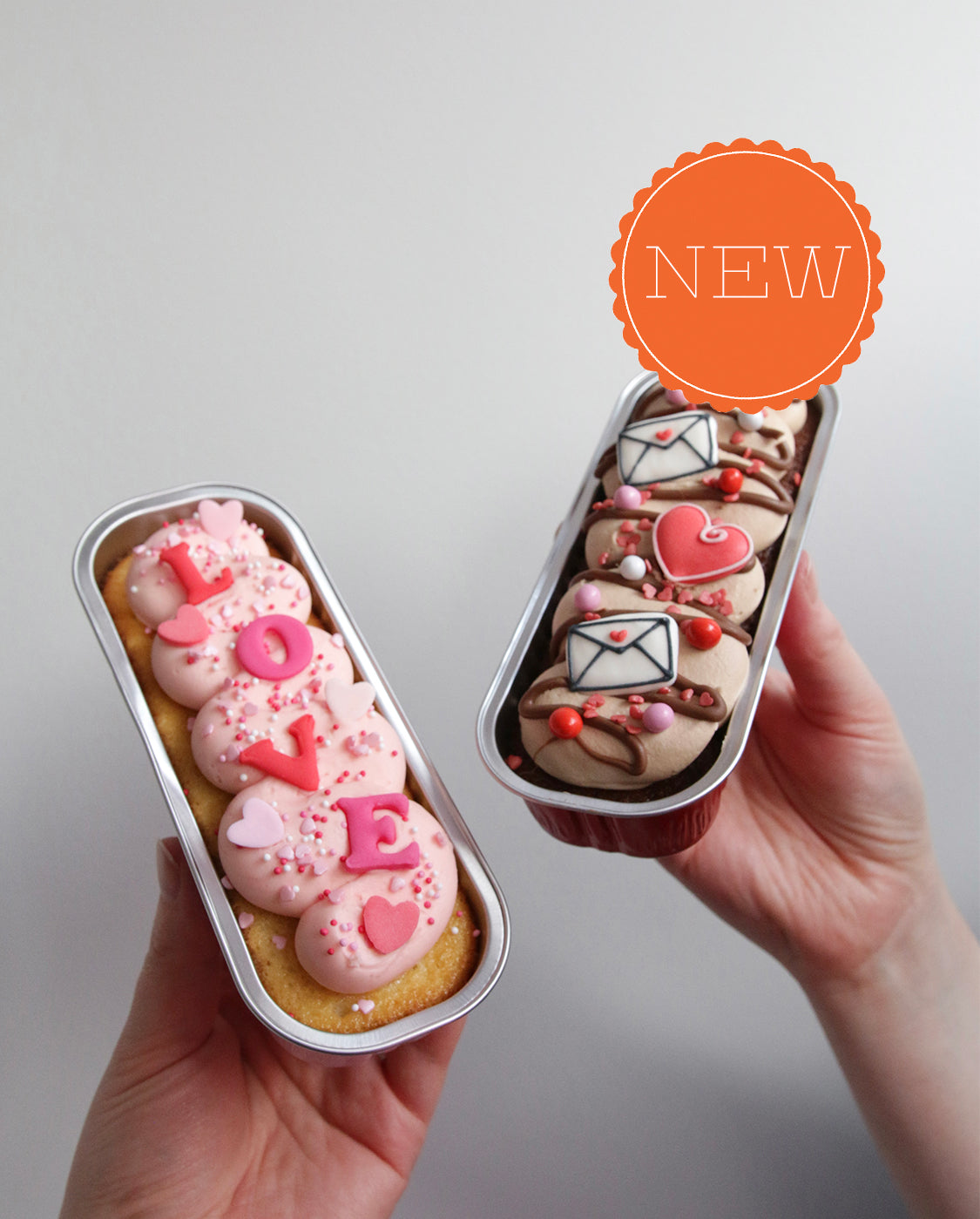 Holding Set of Two Valentine's Little Loaf Cakes - with New Badge