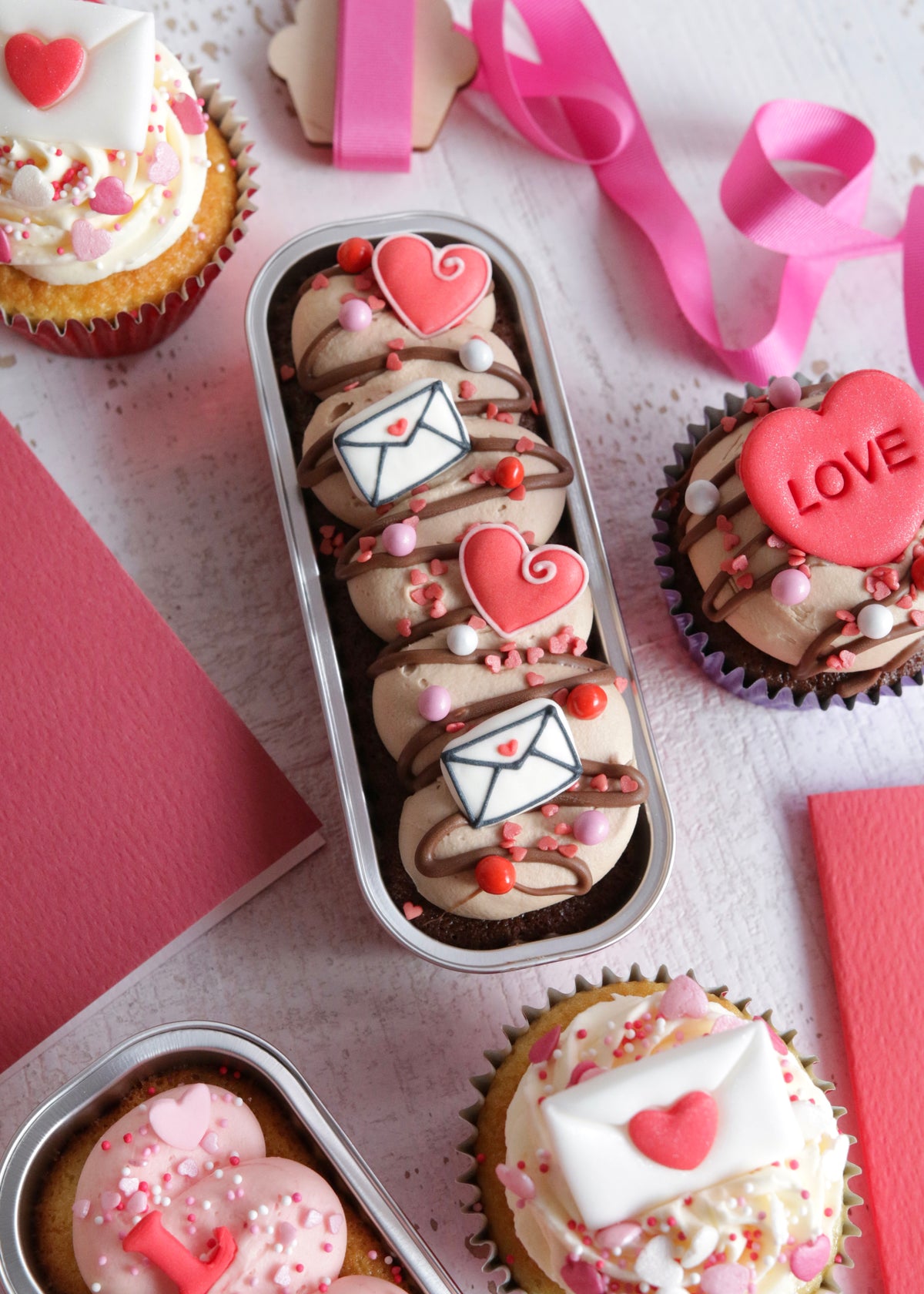 Afternoon Crumbs Valentine's Collection 2025 with close up on Chocolate Little Loaf Cake with Love Letters and Hearts