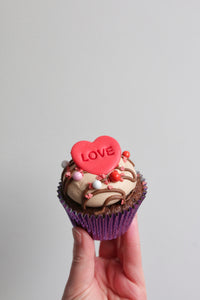 Holding Valentine's Red Love Heart Cupcake