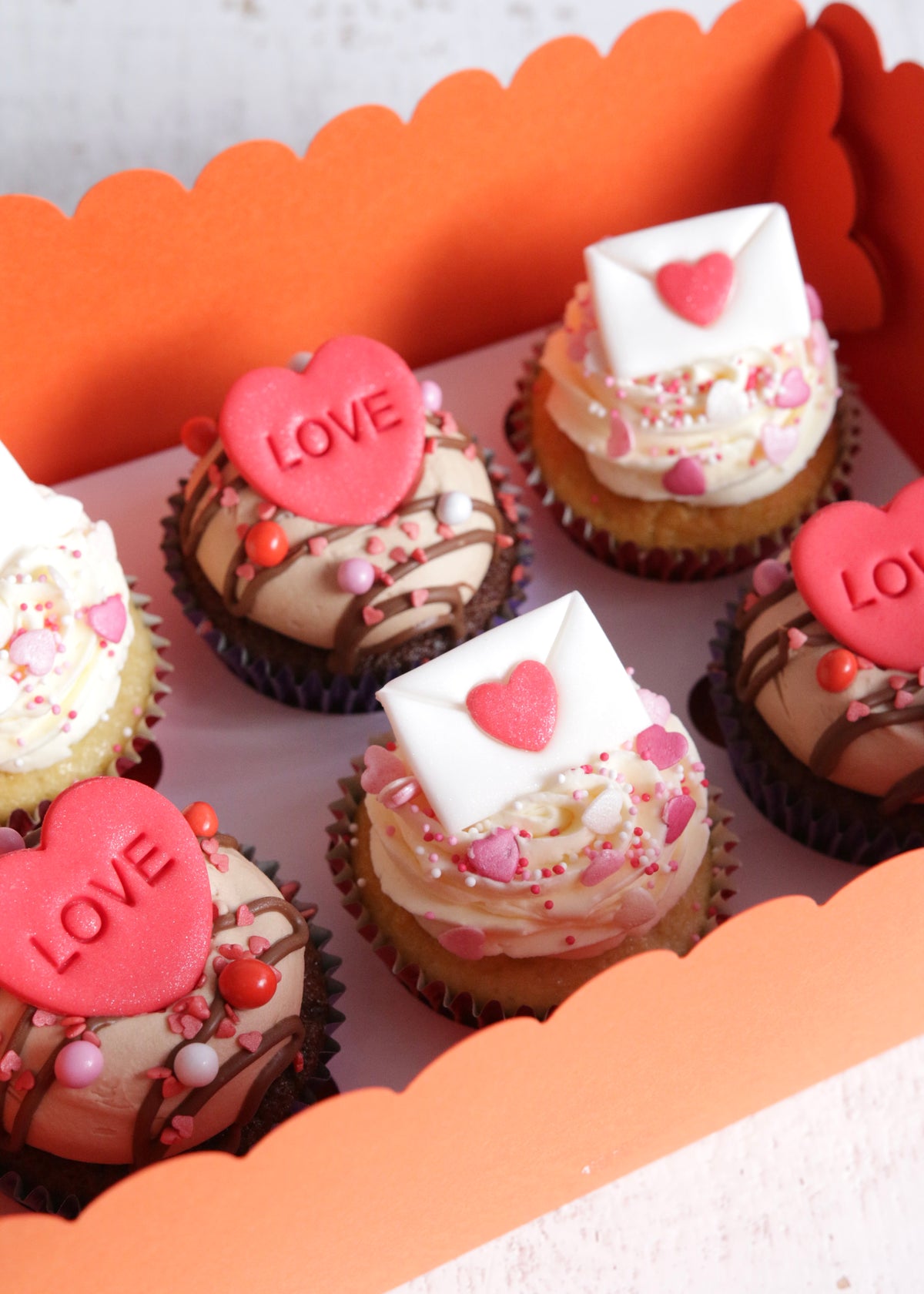 Box of Valentine's Love Letter Cupcakes Close Up