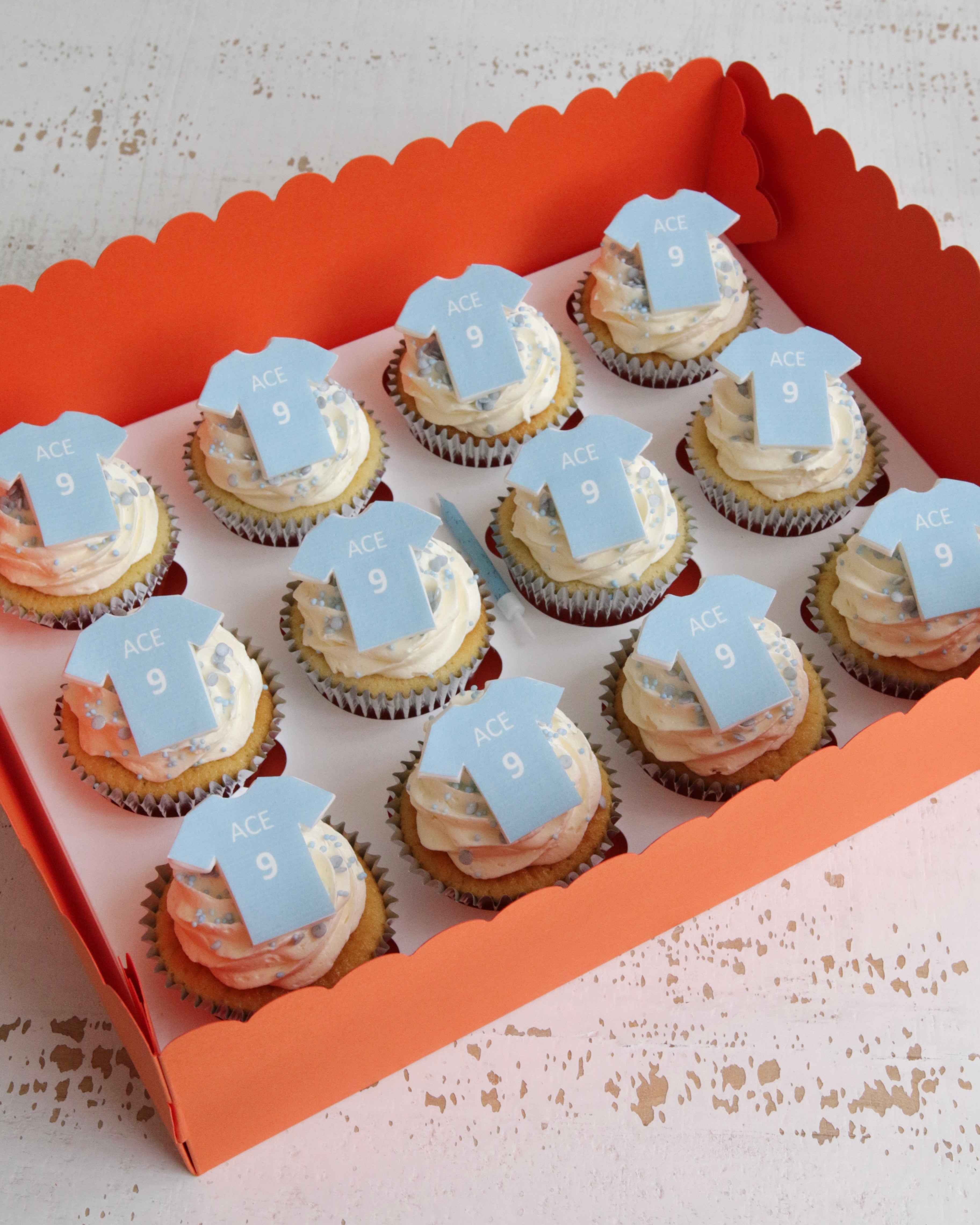 Vanilla Cupcakes with Personalised Blue Football Shirt Toppers
