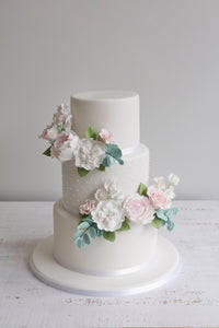 Three Tier Fondant Wedding Cake with Swiss Dots and Pink and White Sugar Flowers