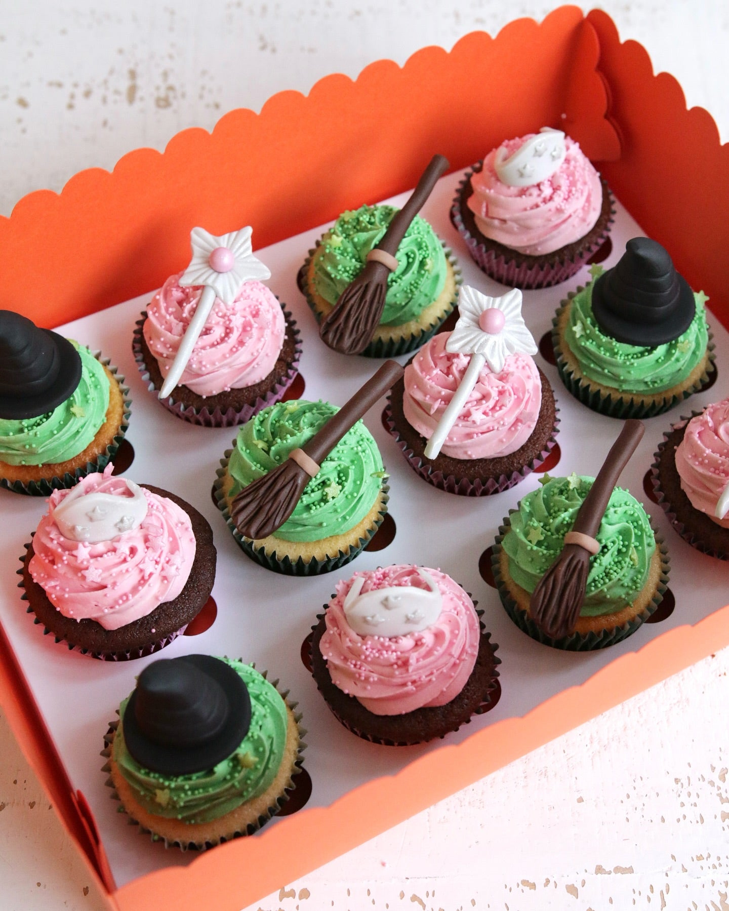 Wicked Musical Cupcakes Green and Pink Frosting with Witches Hat, Broom, Wand and Tiara Decorations