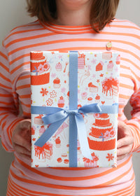 Holding Cake & Cupcakes Orange Wrapping Paper