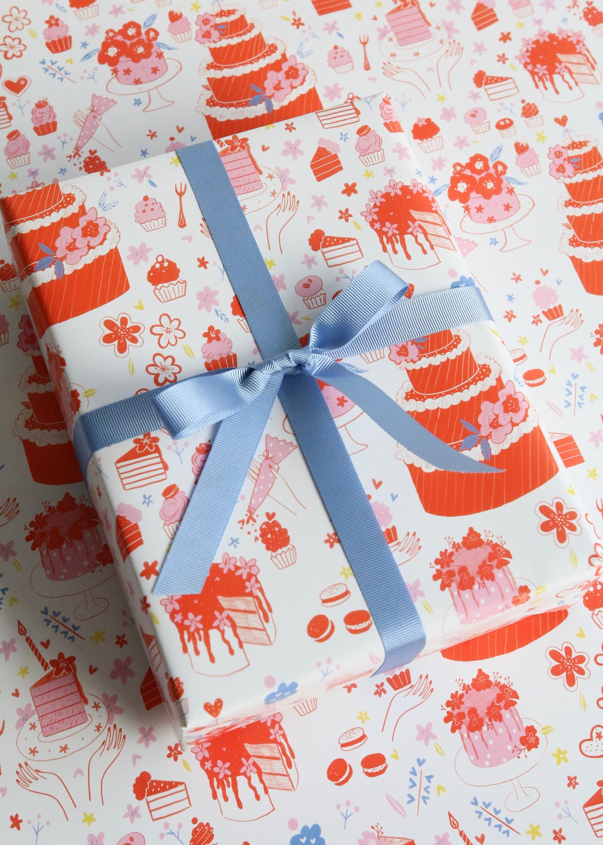 Cake & Cupcakes Orange Wrapping Paper Close Up with Ribbon