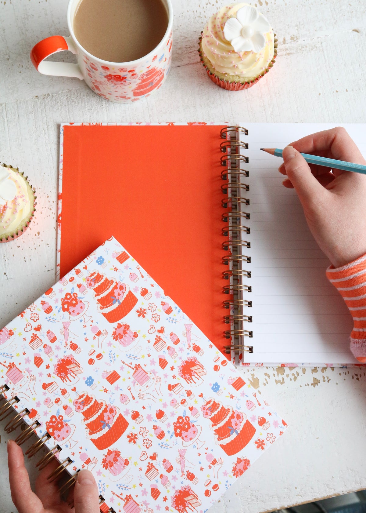 Illustrated Notebook Featuring Cake & Cupcakes writing on lined paper