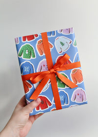 Christmas Jumper Biscuit Wrapping Paper Holding Wrapped Box