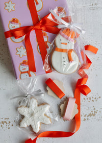 Christmas Snowman Biscuit Wrapping Paper Flat Lay with Biscuits