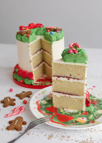 Christmas Wreath Cake Cut with Slice on Plate