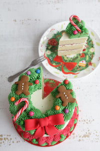 Christmas Wreath Cake Cut with Slice on Plate from Above