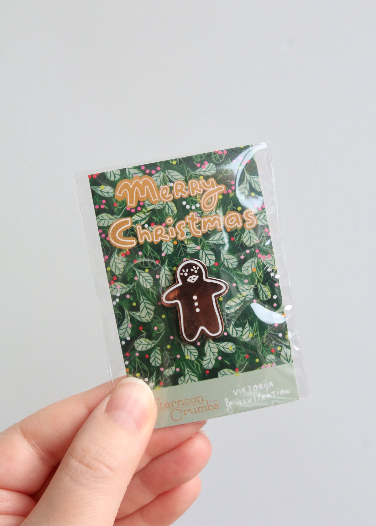Gingerbread Enamel Christmas Pin Holding