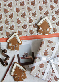 Gingerbread House Wrapping Paper with Houses and Card Flat Lay