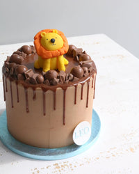 Lion Chocolate Drip Cake