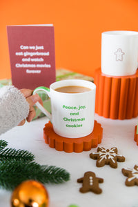 Peace Joy Christmas Cookies Mug Holding on Plinth with Christmas Collection.jpg