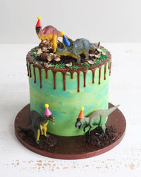 Green Dinosaur Party Hats Drip Cake