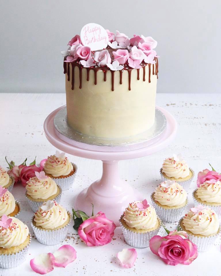 Vanilla Buttercream Drip Cake with Pink Flowers and Cupcakes